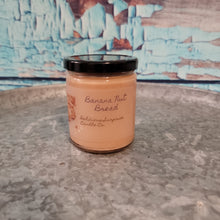 Load image into Gallery viewer, The front view of our 9 ounce candle.
